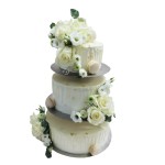 Tort weselny na stelażu wzór Tzk16 | Drip Cake z makaronikami, kwiatami i złotem